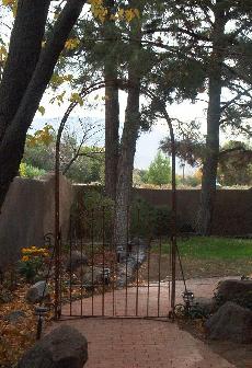 The entrance walk at the Sandhill Crane Bed and Breakfast leads to the front door or winds through the gardens to our portal